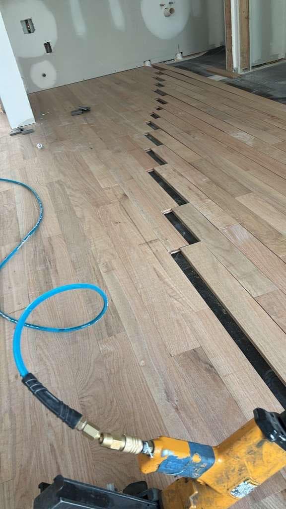 Hardwood installation before the final sanding and finish